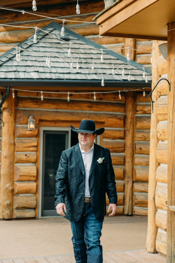 Bride walking down aisle at Bentwood Inn Jackson Hole wedding