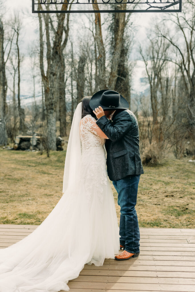 Outdoor wedding ceremony at Bentwood Inn Jackson Hole Wyoming March
