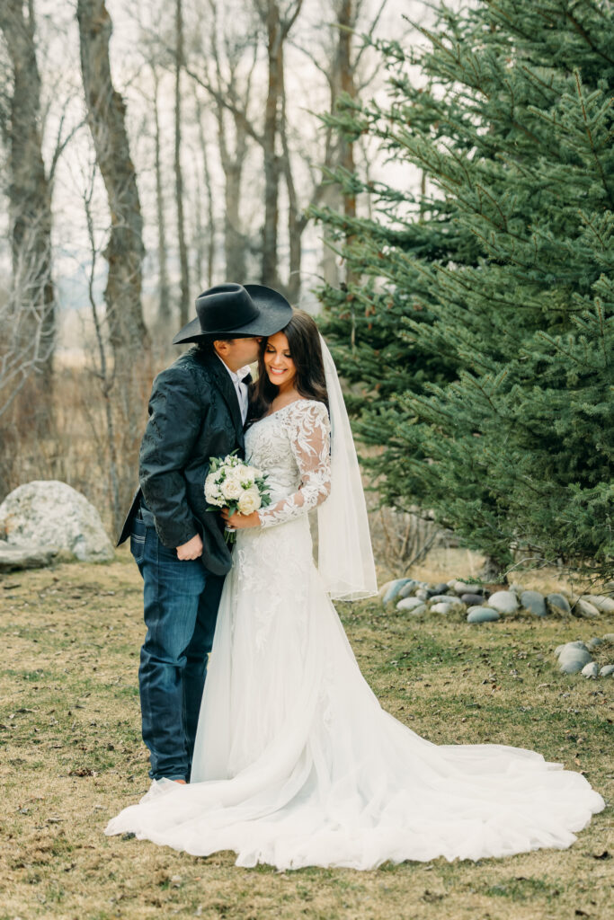 Bride and groom candid moment at Jackson Hole wedding reception